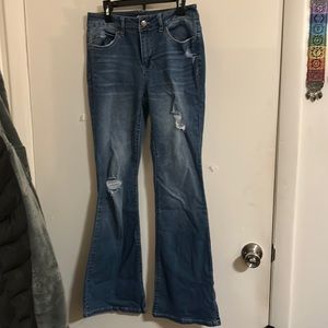 Distressed bell bottom d. jeans